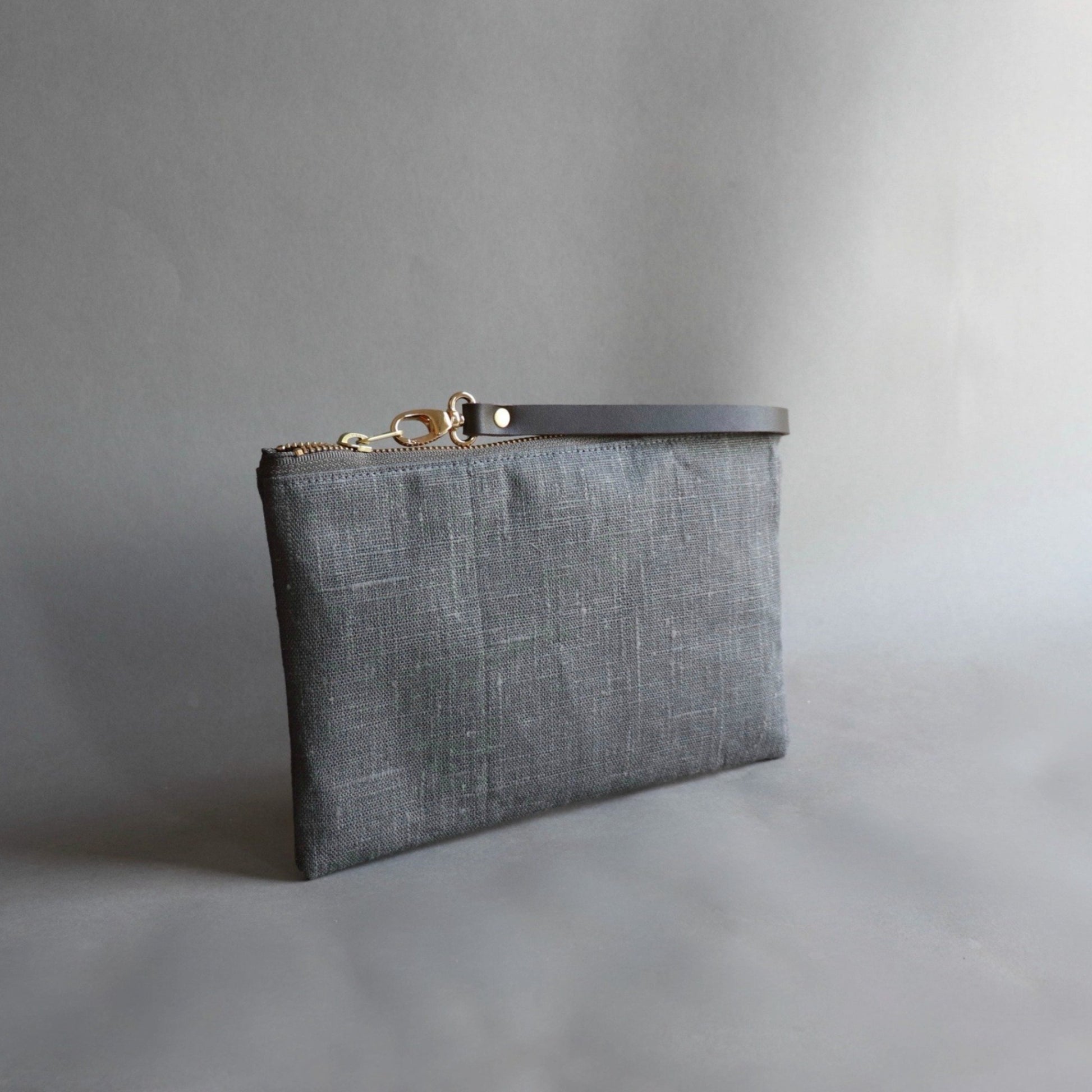 Gray clutch bag