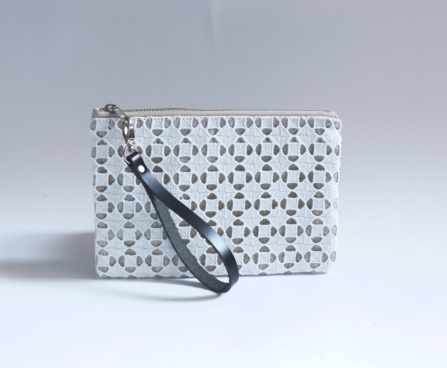 ivory wristlet