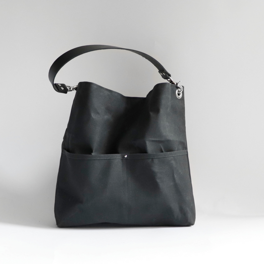 Large Waxed Canvas Hobo Style Bag wth two exterior pockets and one shoulder strap