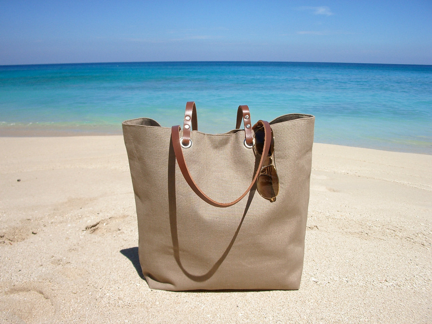 vacation bags on beach